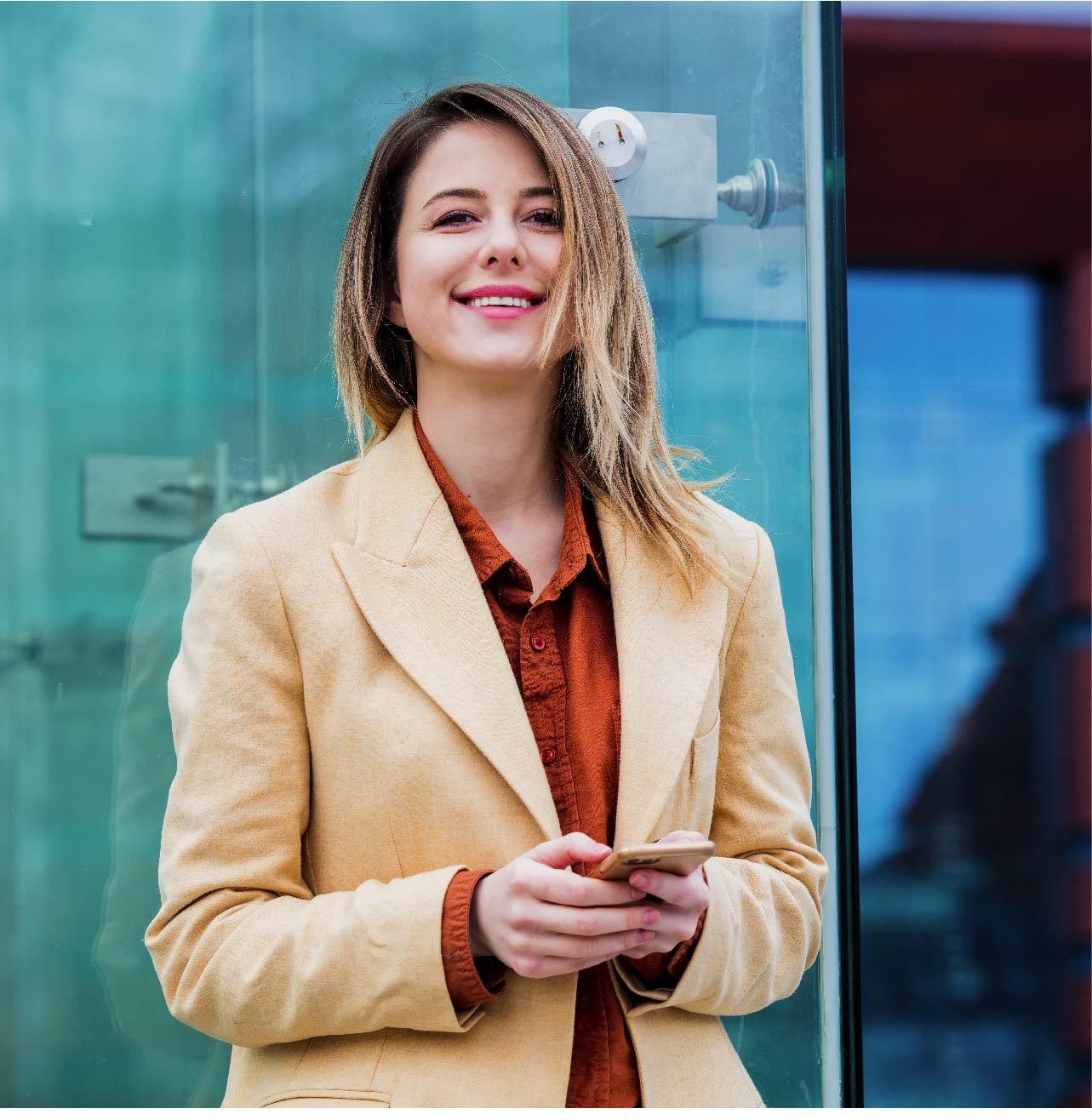 business woman standing in front of office